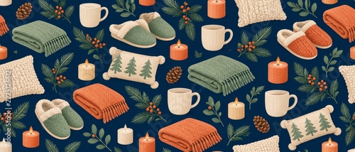 Seamless autumn winter pattern featuring knitted blankets, slippers, ceramic mugs, candles, pinecones, evergreen branches, berries, and woodland tree pillows on dark blue background for seasonal home,