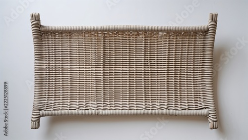 Rectangular woven wicker tray viewed from above