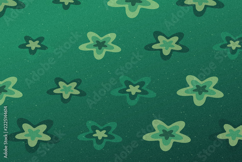 Emerald and teal radial rosette pattern with fine dusty grain and speckled symmetry for an abstract decorative background