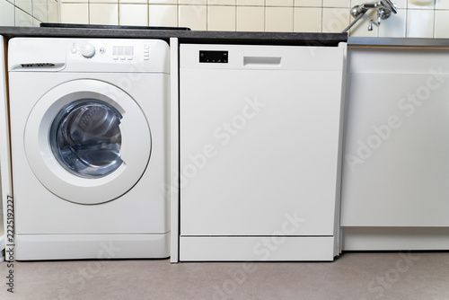 Washing machine and dishwasher in a modern kitchen