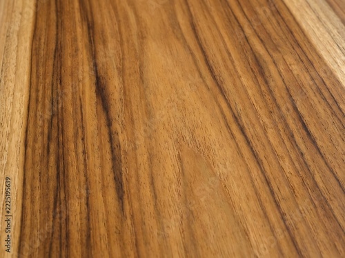 Warm toned wood grain texture with natural patterns and close up detail