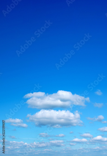 Sticker Blue sky background with tiny clouds