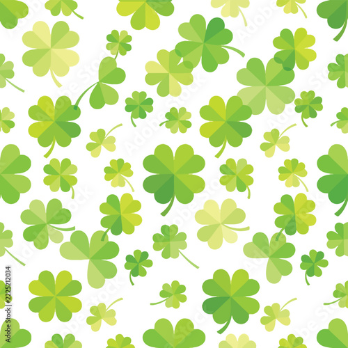 Clover leaves pattern fills the frame with a repetitive arrangement of lucky green four-leaf plants.