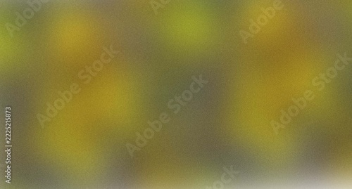 Abstract green and yellow light bokeh background with soft blurred nature textures