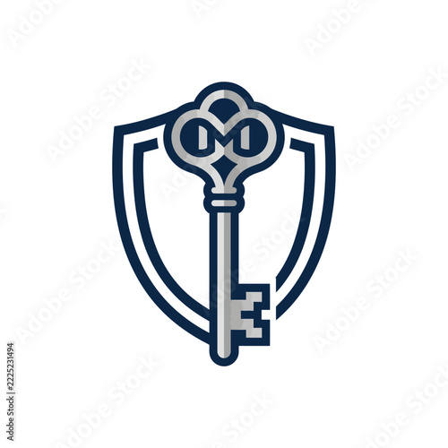 Antique skeleton key inside a protective shield logo