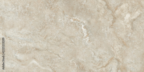 Fotografie A sophisticated beige stone texture featuring warm ivory, sand, and light taupe tones with subtle mineral variations, delicate white formations, and natural-looking veins