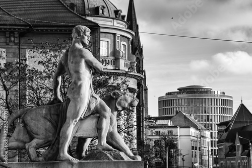 Poznan, Poland - Black and White View of a Male Figure Riding a Lion Sculpture Near the Theatre