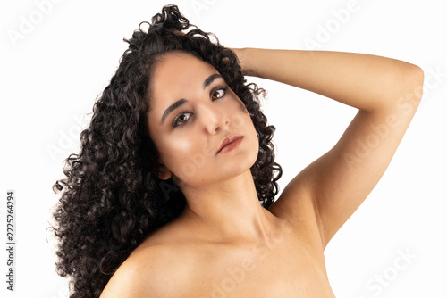 Beautiful Woman with Voluminous Natural Black Curly Hair on White Background, Beauty Portrait	