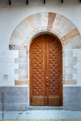 old wooden door in a stone wall