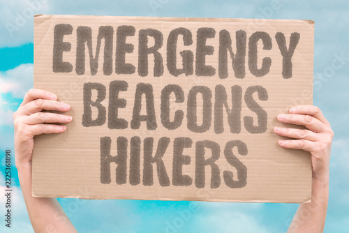 Fotografie "Emergency beacons hikers" Walkers carry satellite devices that summon help when injuries, storms, or darkness leave them stranded
