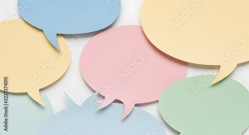 Colorful Speech Bubbles Overlapping on Light Background Creating a Playful Atmosphere for Communication and Expression of Ideas and Thoughts