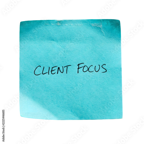 Blue adhesive note with client focus written on transparent background