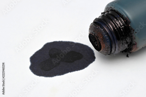 black ink spilling on paper
