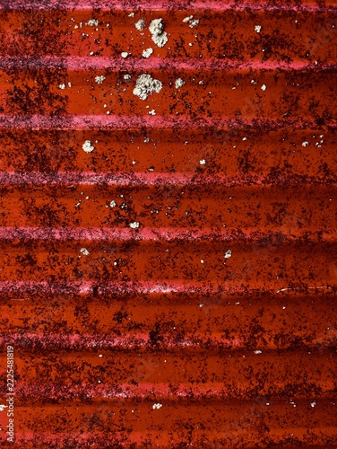 Red  Weathered Surface with White Deposits and Dark Spots