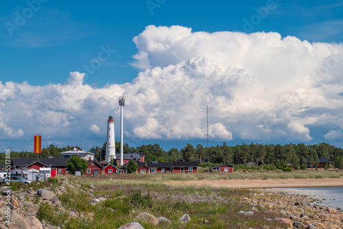 Finland. Marjaniemi Lighthouse, built in 1871 on the island of Hailuoto near the city of Oulu. A modern marine navigation radar system is located nearby.