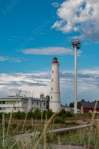 Finland. Marjaniemi Lighthouse, built in 1871 on the island of Hailuoto near the city of Oulu. A modern marine navigation radar system is located nearby.