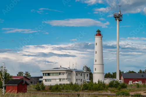 Finland. Marjaniemi Lighthouse, built in 1871 on the island of Hailuoto near the city of Oulu. A modern marine navigation radar system is located nearby.