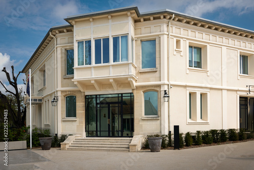 THE FRONT A MODERN CHIC BUILDING WITH A OPEN WALKWAY AND NICE SKY IN EPERNAY FRANCE