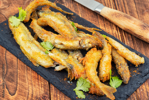 Crispy breaded fried capelin with lemon