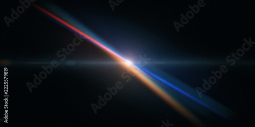 Diagonal lens flare with glowing orange and blue light streaks on a solid background, cinematic optical effect