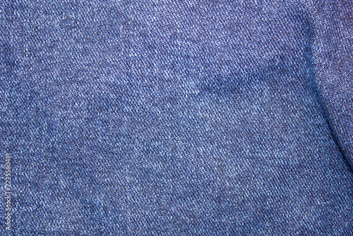 Authentic denim surface, denim fabric texture. Denim material, blue denim, background, wallpaper.