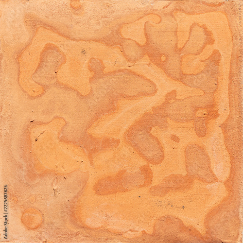 Adobe mud plaster creating an abstract textured background with unevenbackground patterns