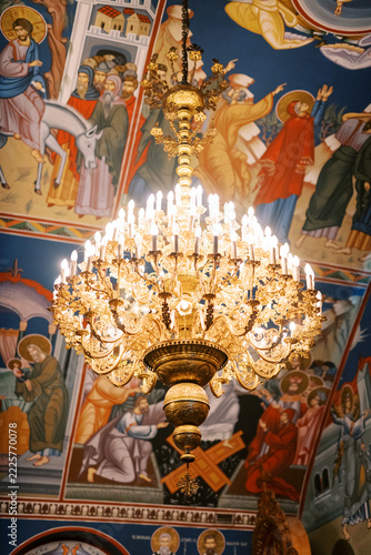 Fotografie Golden chandelier and frescoes in St