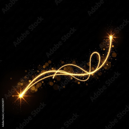 Abstract golden glowing light trail with sparkles and magical particles.
