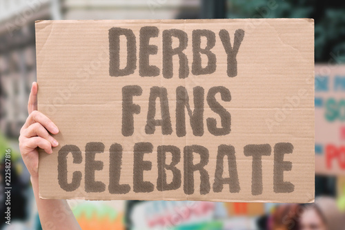 Fotografie "Derby fans celebrate" Neighbors' rivalry ends in joy