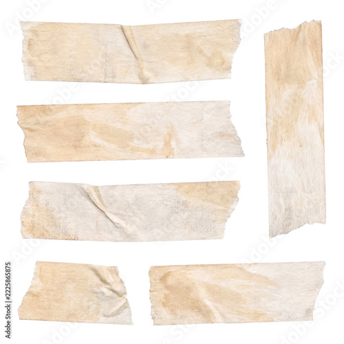 Old stained torn masking tape pieces with rough edges