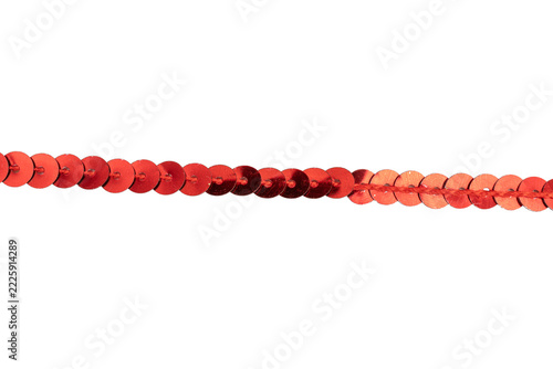 Fotografie Red sequin trim strand in a row isolated on transparent PNG