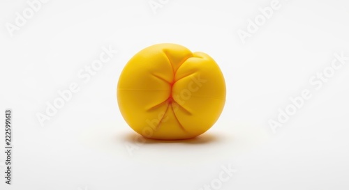 Yellow Squeezed Stress Ball Isolated on White Background Studio Shot for Anxiety and Tension Relief