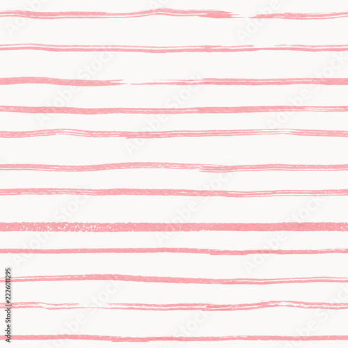 Seamless pattern with pink hand drawn stripes