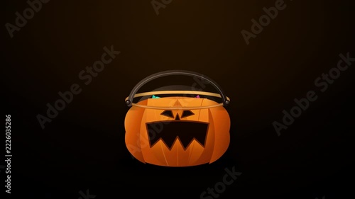 A spooky animated Halloween pumpkin bucket filled with colourful sweets against a dark backdrop