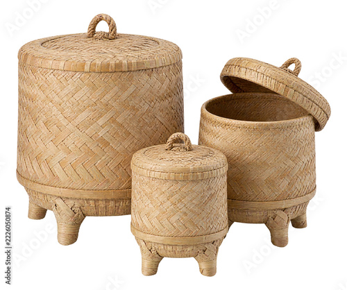 Three Thai kratip woven bamboo sticky rice baskets of different sizes isolated on transparent background