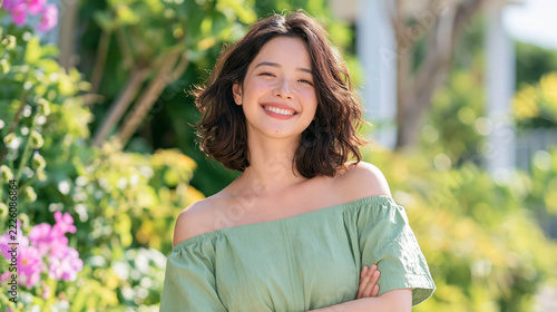 Happy Asian Woman in a Vintage Light Green Dress Walking Through a Garden