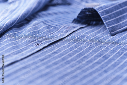 Close up of men's linen shirt. Soft focus.