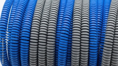 Blue and grey plastic corrugated flexible conduit