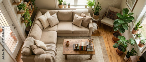 Cozy living room with sectional sofa houseplants and wooden coffee table Natural light inviting atmosphere
