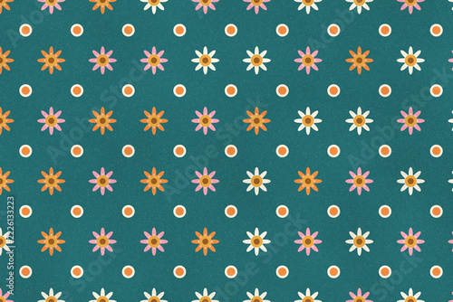 Sixties flower power daisy pattern in pink, orange and cream on teal