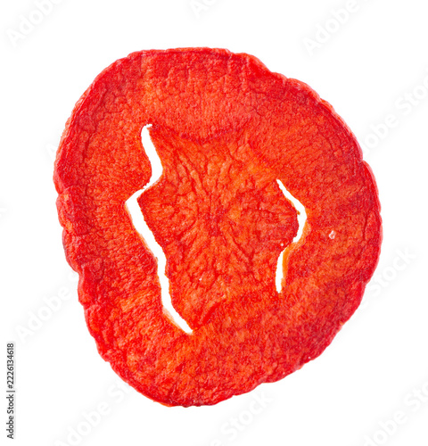 Crispy roasted carrot chips with sea salt, isolated on white background. Healthy and crunchy natural vegetable snack. Clipping path.