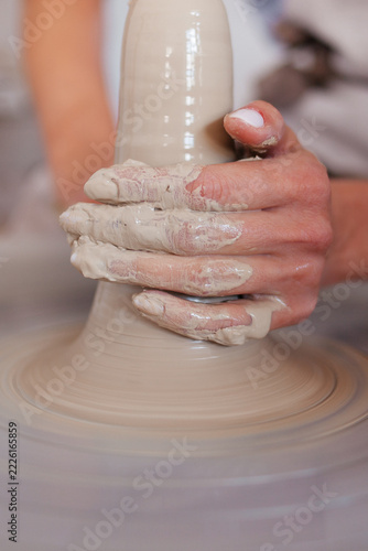 Pottery Making Process. Female Potter Working with Clay in Ceramic Workshop