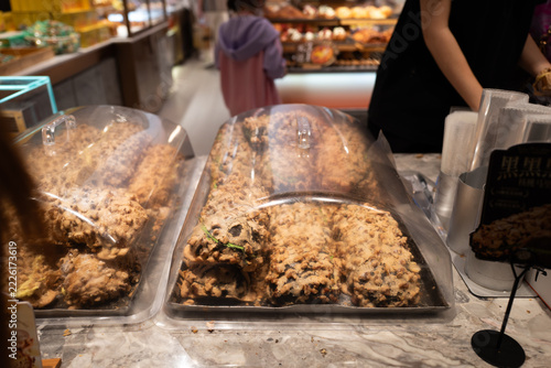 Delight in Portuguese confectionery at the bustling market. Explore delectable traditional treats