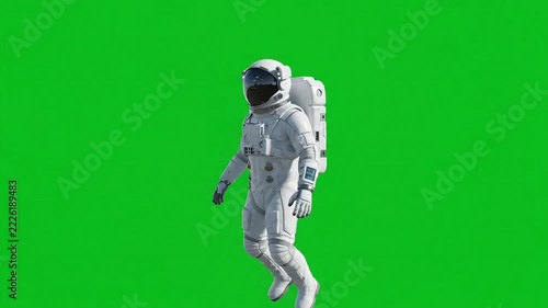 Astronaut Floating in Zero Gravity on Green Screen Background
