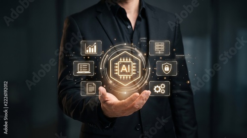 Businessman holding glowing futuristic artificial intelligence processor icon in hand
