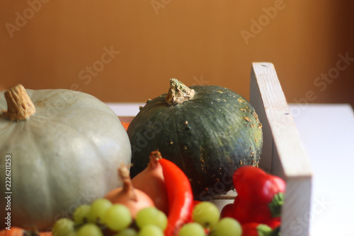 White wooden crate full of seasonal autumnal produce. Selective focus.