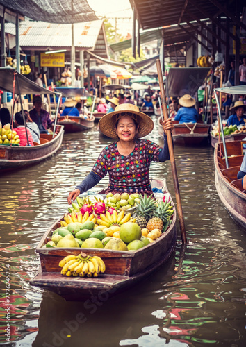 vibrant scene at a traditional floating market in Thailand