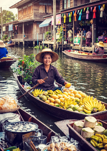 vibrant scene at a traditional floating market in Thailand
