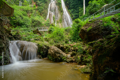 Scenic Waterfall at Namtok Than Behind the Gorge in Natural Setting