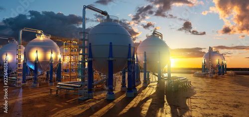 Natural gas storage, spherical pressure tanks and pipelines form an industrial energy facility for gas processing, storage and distribution,